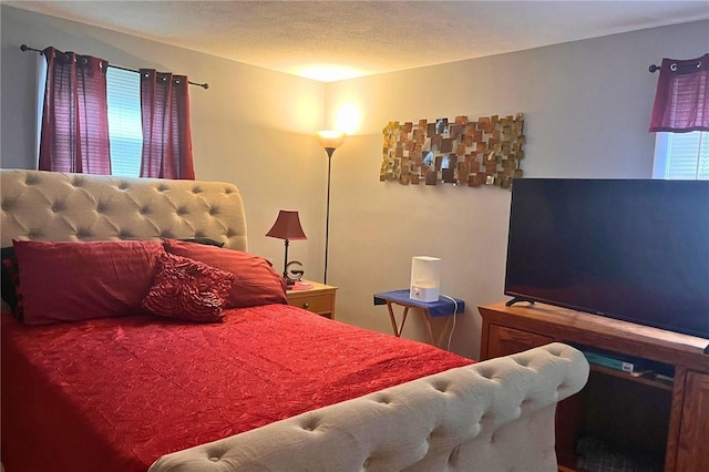 bedroom featuring a textured ceiling