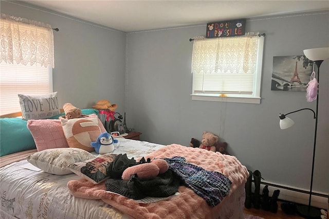 bedroom featuring a baseboard radiator