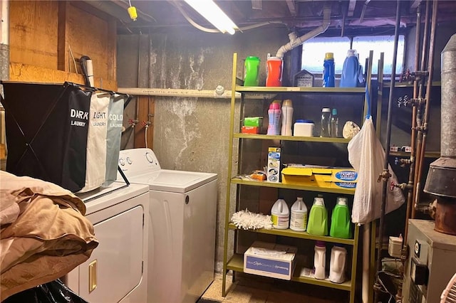 washroom with laundry area and independent washer and dryer