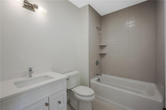 full bathroom with vanity, toilet, and tiled shower / bath combo