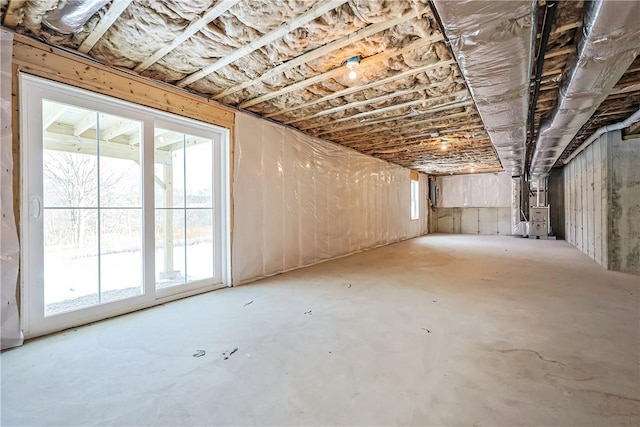 basement featuring heating unit