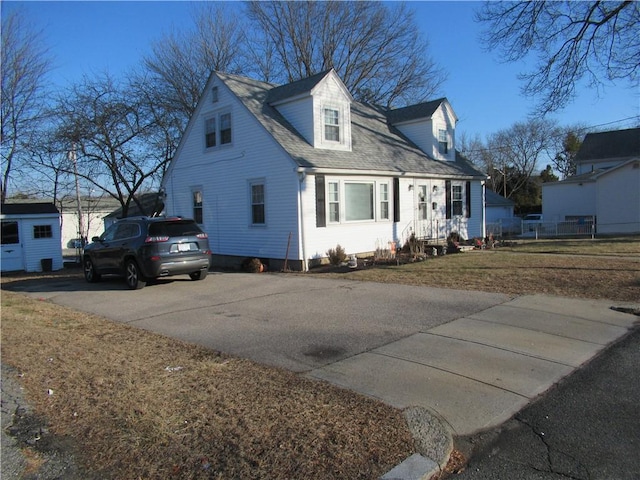 view of new england style home