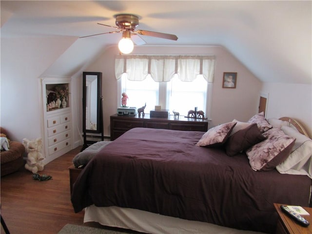 bedroom featuring wood-type flooring, ceiling fan, and lofted ceiling