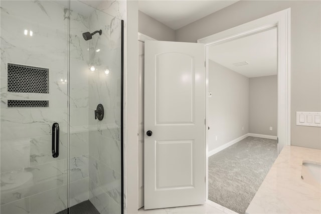 bathroom featuring vanity and walk in shower