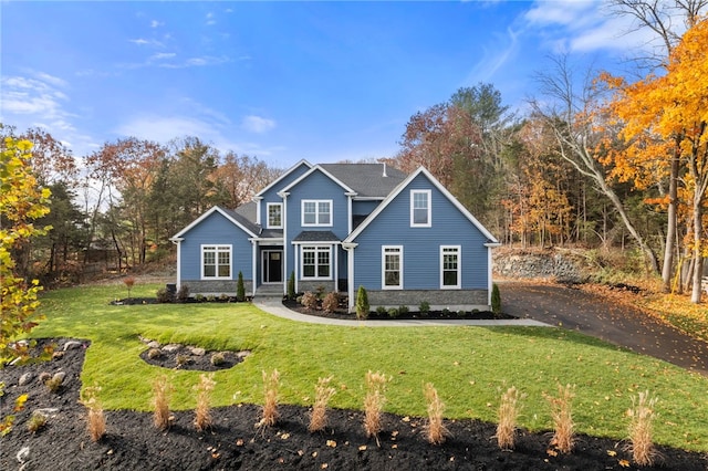 view of front of home featuring a front lawn