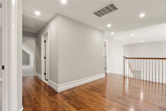 hallway with dark wood-type flooring