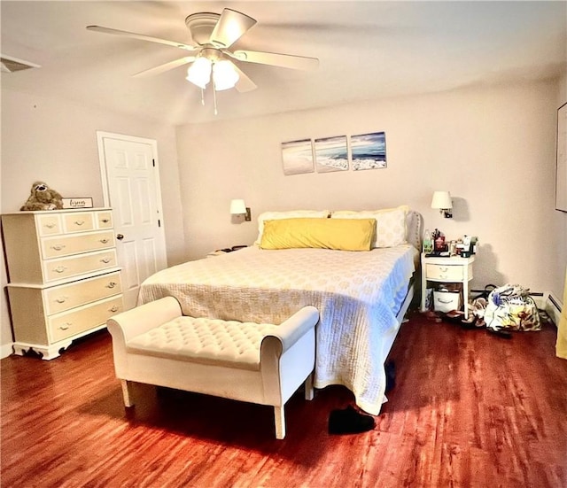 bedroom with ceiling fan and dark wood-type flooring