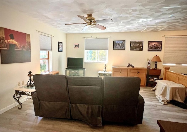 living room featuring ceiling fan