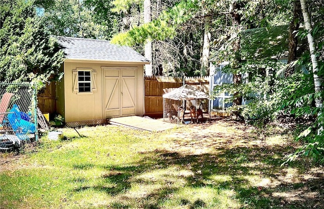 view of outdoor structure with a lawn