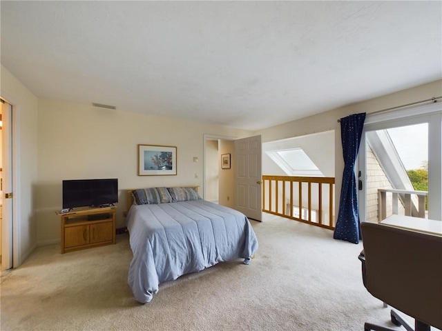 bedroom with light colored carpet