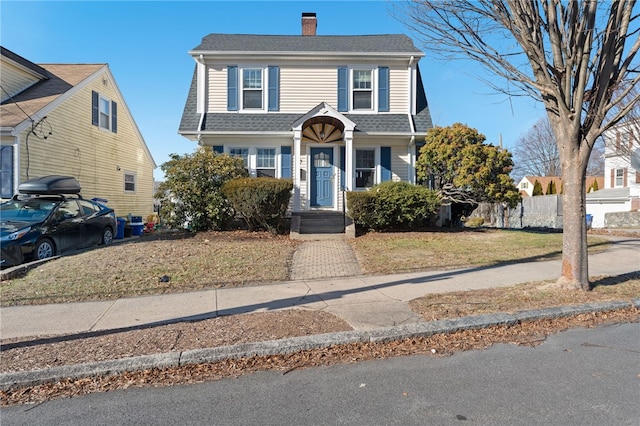 view of front of property with a front lawn