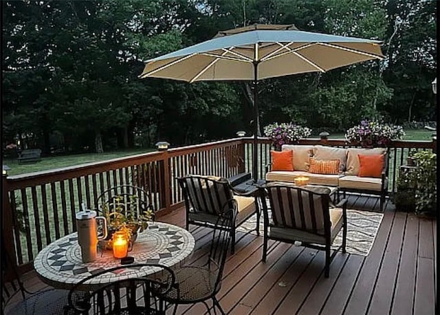 wooden terrace featuring an outdoor hangout area