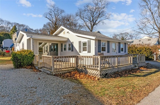 rear view of property with a deck