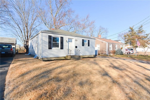 view of front of house featuring a front yard