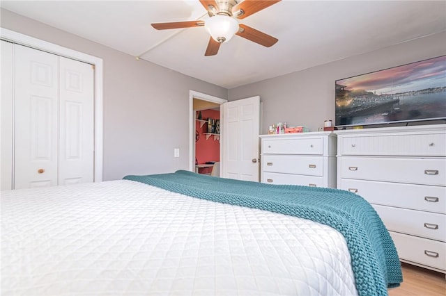 bedroom with ceiling fan and light wood-type flooring