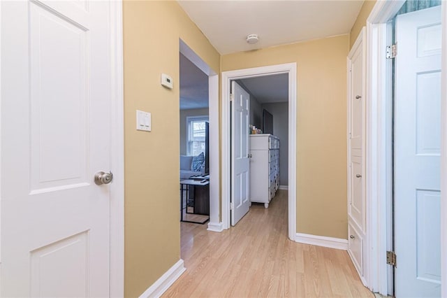 hallway featuring light wood-type flooring