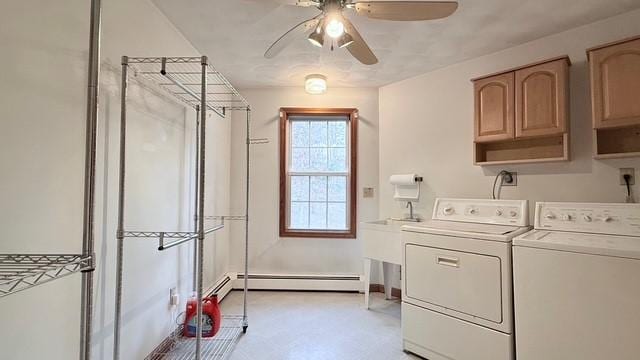 laundry area featuring cabinets, ceiling fan, washer and clothes dryer, and baseboard heating