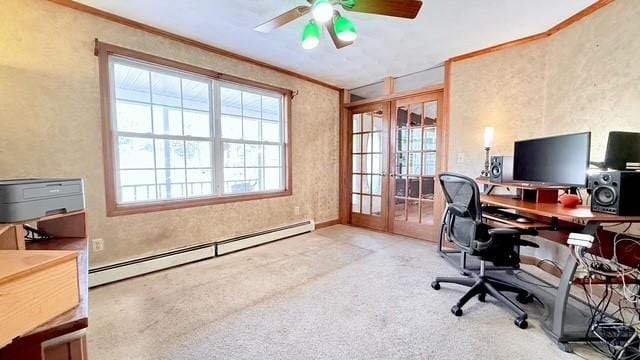 carpeted office with a baseboard heating unit, crown molding, french doors, and ceiling fan