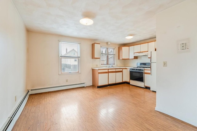 kitchen featuring white appliances, a baseboard radiator, and light hardwood / wood-style flooring