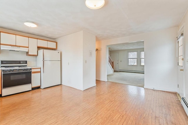 kitchen with baseboard heating, light hardwood / wood-style flooring, white cabinets, and white appliances