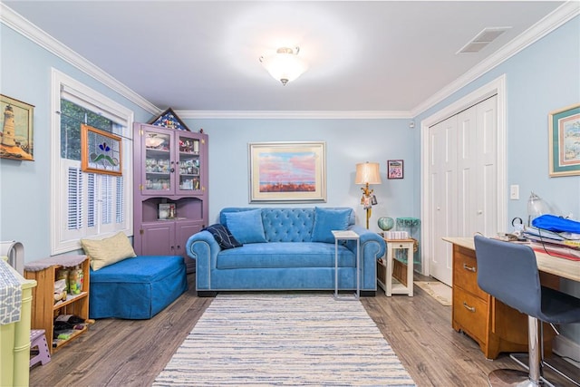 office area with crown molding and hardwood / wood-style flooring