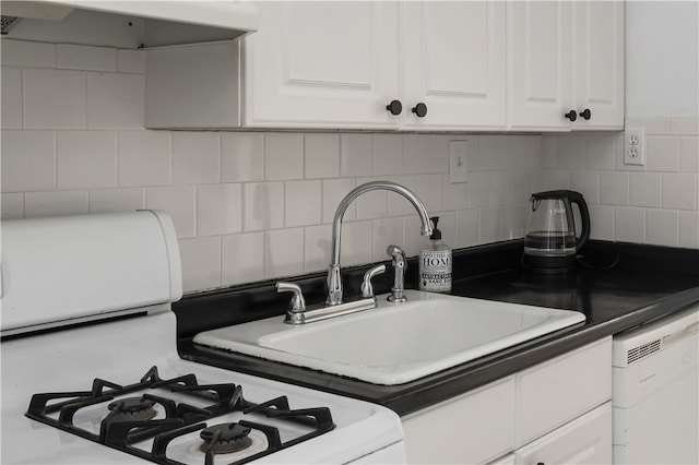 kitchen with white appliances, backsplash, white cabinets, and exhaust hood