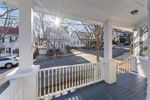 wooden deck featuring covered porch