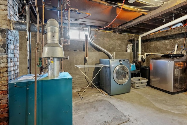 utility room featuring washer and dryer