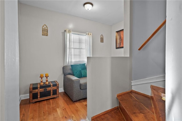 sitting room with light hardwood / wood-style flooring