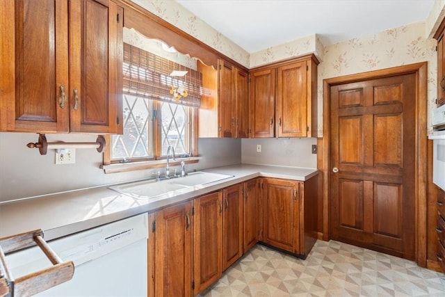 kitchen featuring dishwasher and sink