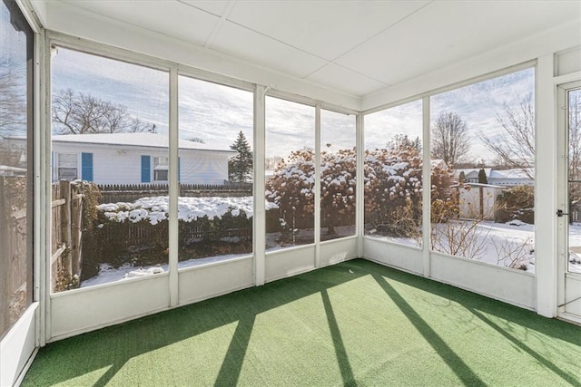 unfurnished sunroom featuring plenty of natural light