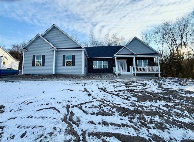 view of front of property featuring covered porch