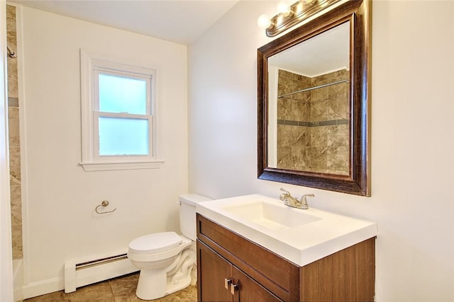 bathroom with toilet, baseboard heating, tile patterned flooring, and vanity