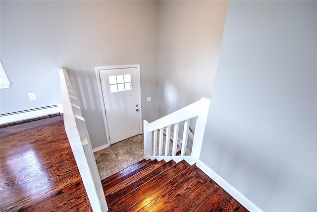 foyer with a baseboard radiator