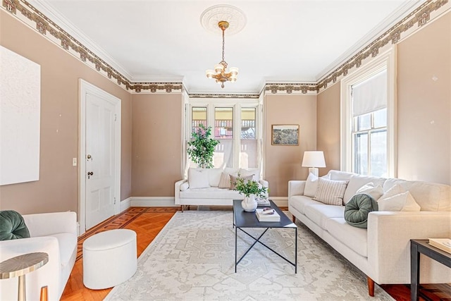 living room featuring an inviting chandelier, parquet floors, a healthy amount of sunlight, and crown molding