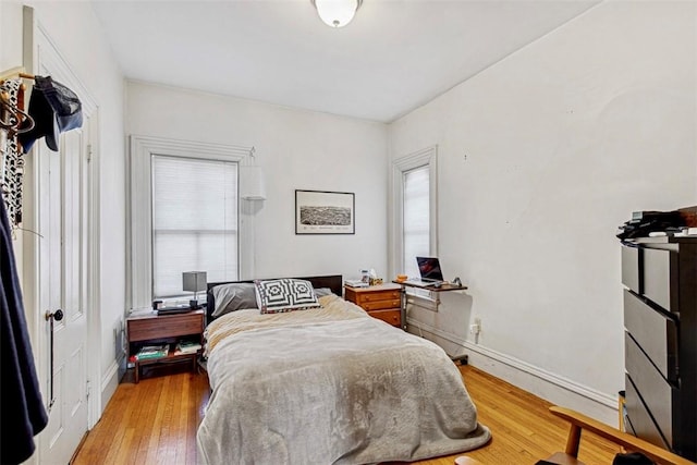 bedroom with light hardwood / wood-style flooring