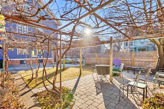 view of patio / terrace with an outdoor fire pit