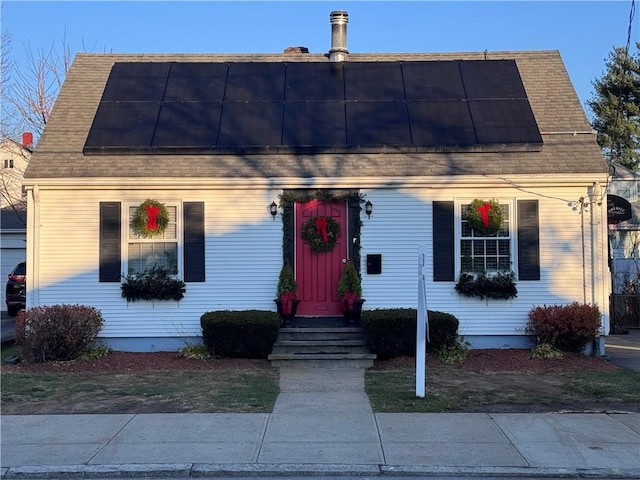 view of front of house with solar panels