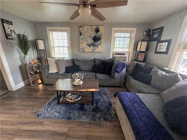 living room featuring ceiling fan, cooling unit, plenty of natural light, and hardwood / wood-style flooring