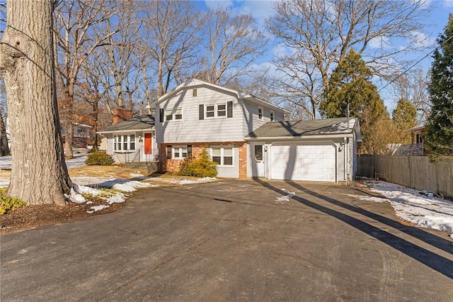 split level home featuring a garage