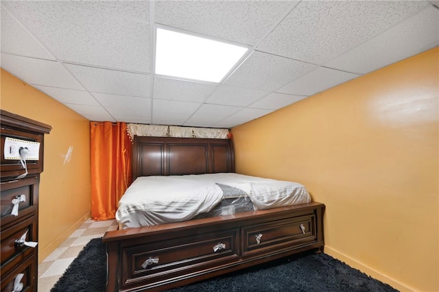 bedroom with a drop ceiling