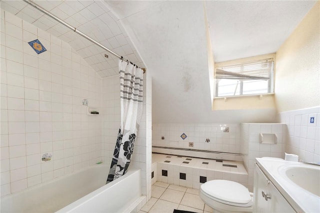 full bathroom featuring shower / tub combo, tile patterned flooring, tile walls, toilet, and vanity