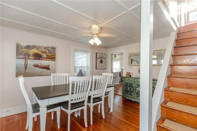 dining area featuring ceiling fan and hardwood / wood-style flooring