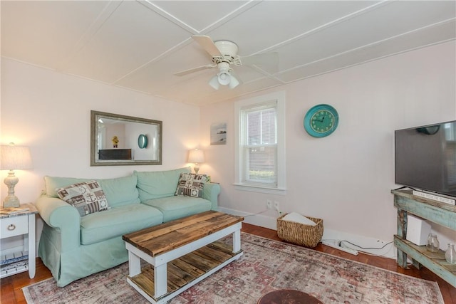 living room featuring ceiling fan and wood-type flooring