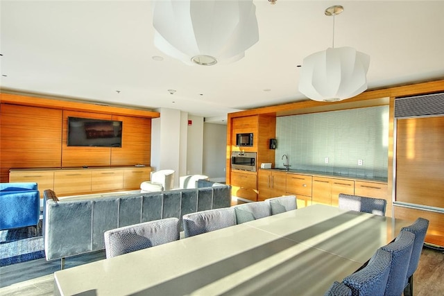 living room with sink and dark hardwood / wood-style flooring