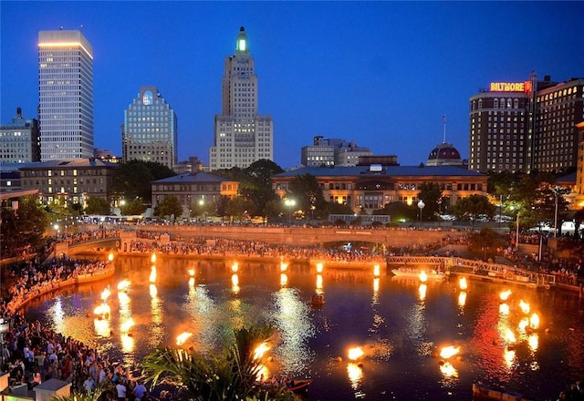 property's view of city featuring a water view