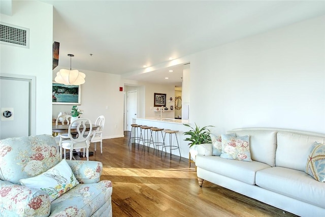 living room with hardwood / wood-style flooring