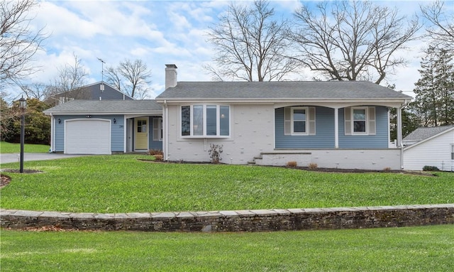 view of front facade featuring a garage and a front lawn