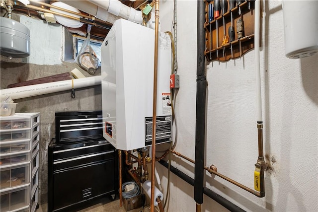 utility room with tankless water heater