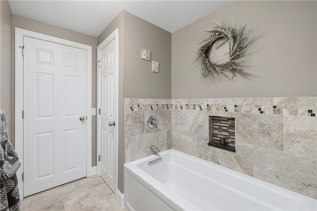 bathroom with a washtub